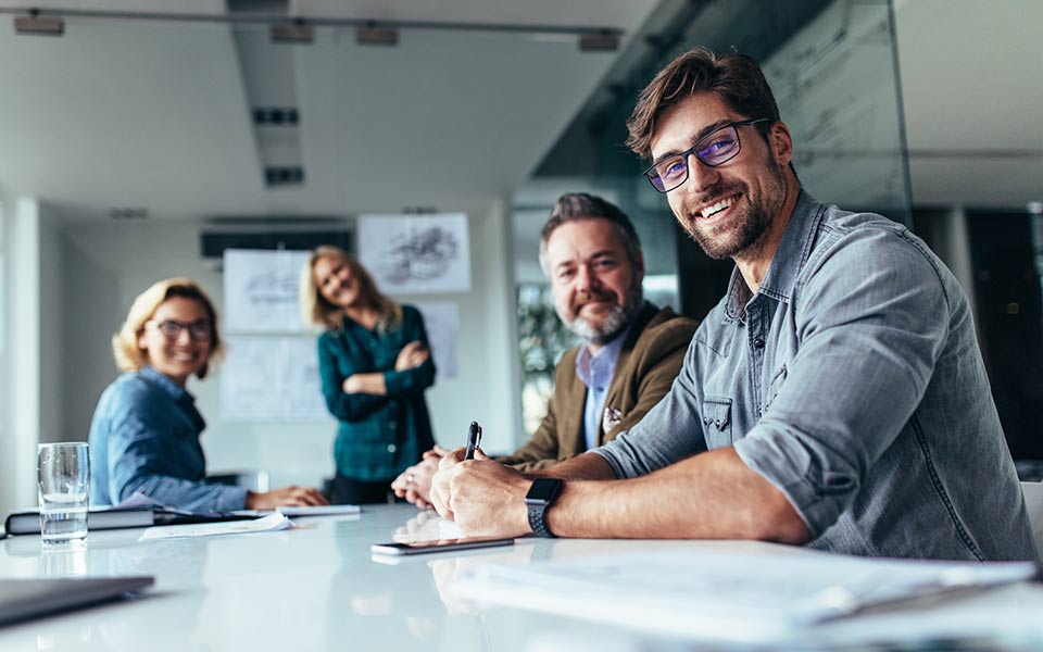 Happy group of businesspeople during presentation