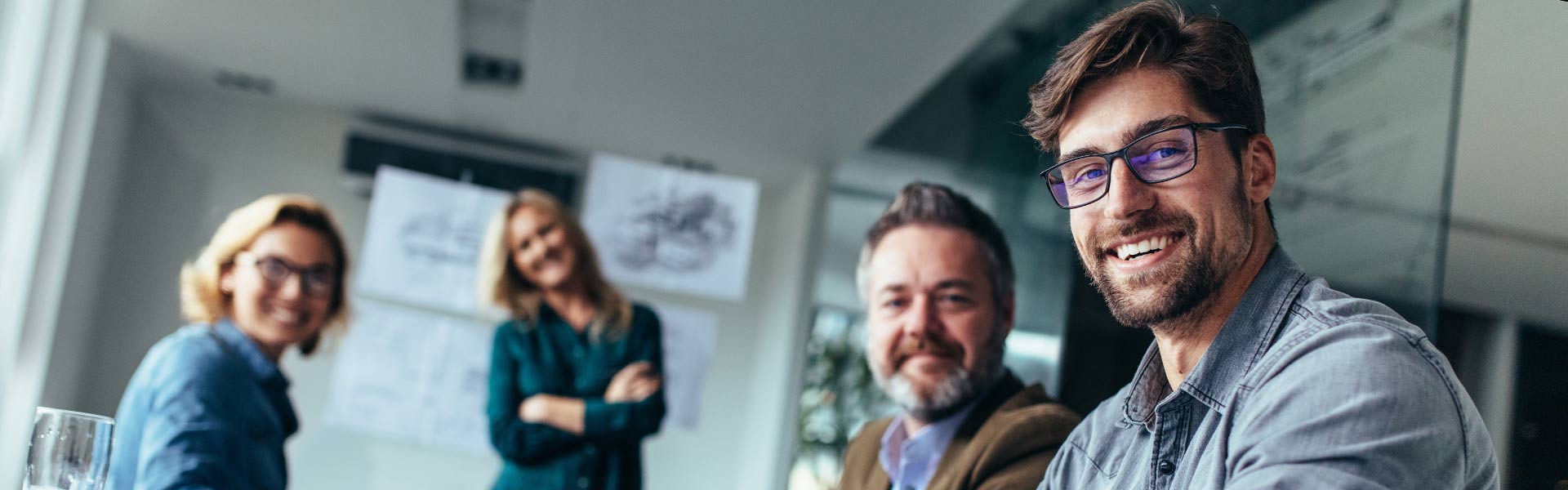 Happy group of businesspeople during presentation